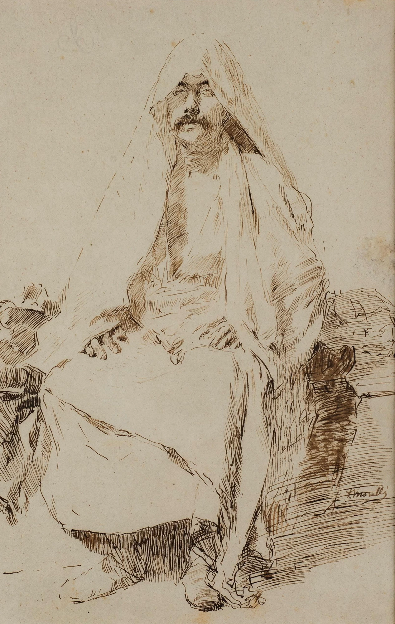 Uomo arabo seduto